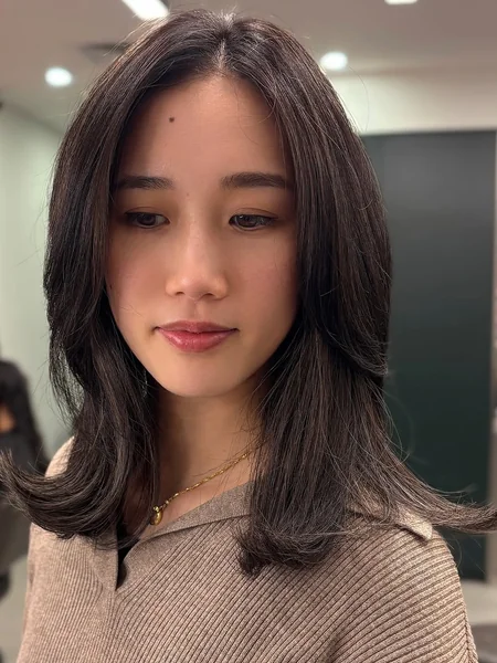 Chic Brunette Bob with Tapered Face-Framing Layers