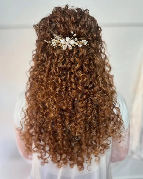 Chic Brunette Curly Bob with Retro Frames