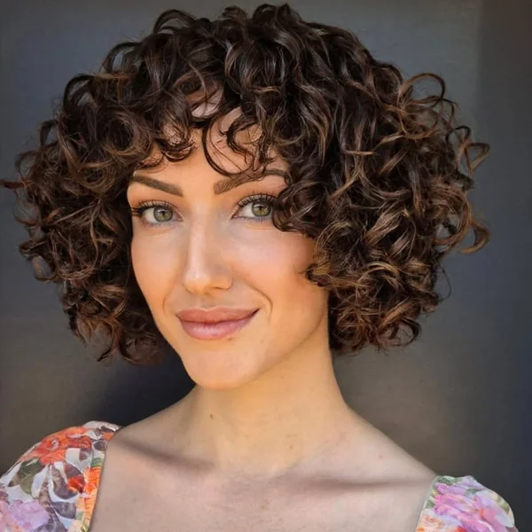 Chic Brunette Curly Bob with Tapered Fringe