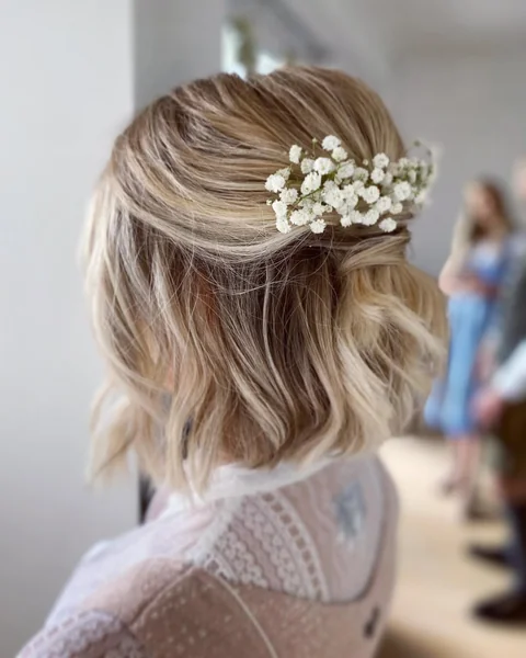 Chic Brunette Half-Up Knot with Soft Undone Waves