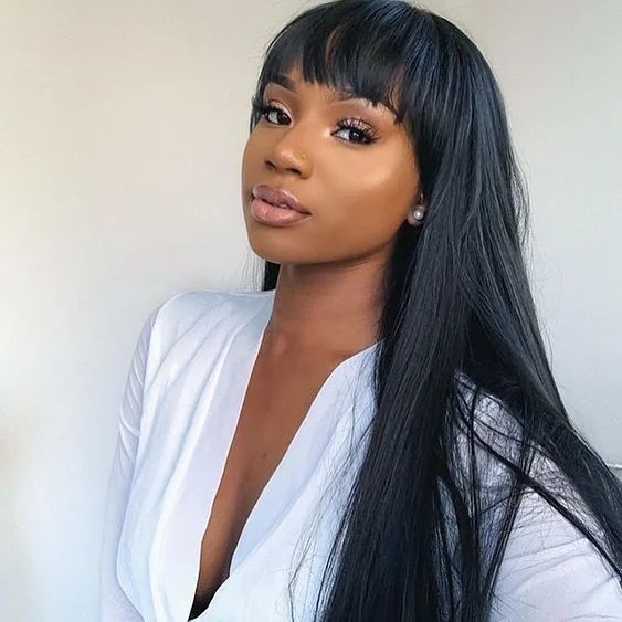 Chic Brunette Shag with Thick Curtain Bangs