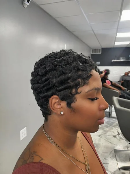 Chic Platinum Pixie with Wispy Layers