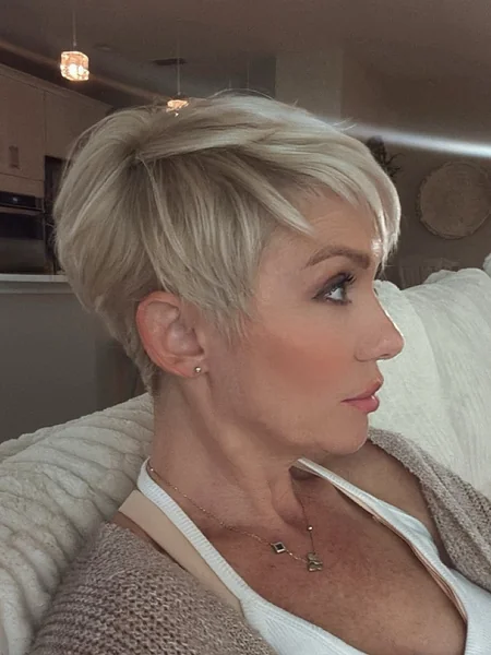 Chic Platinum Pixie with Wispy Tapered Layers