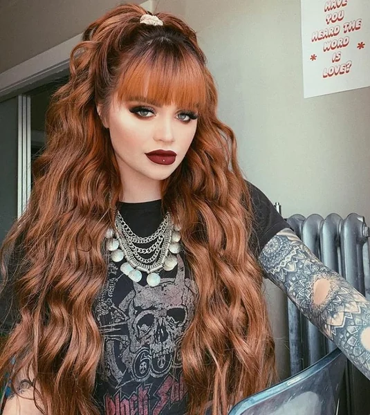 Chic Sun-Kissed Shag with Airy Wispy Bangs