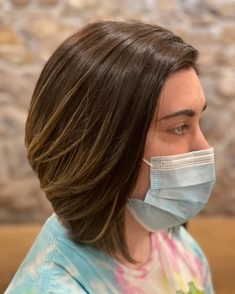 Chic Sun-Kissed Stacked Bob with Soft Tapered Layers
