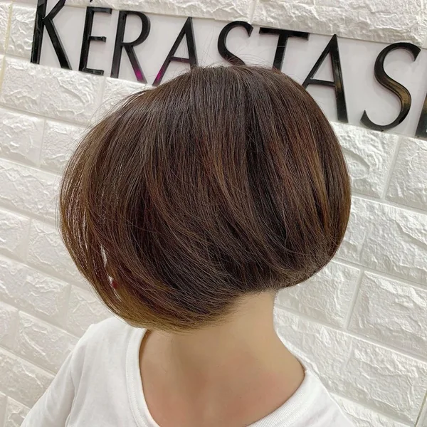 Chic Tapered Undercut Bob with Voluminous Brunette Layers