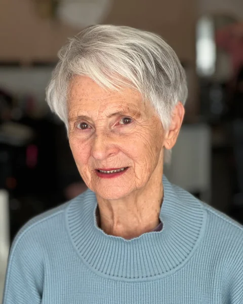 Chic Textured Silver Pixie with Soft Side-Swept Fringe