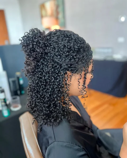 Chic Voluminous Pineapple Updo for Tight Curls