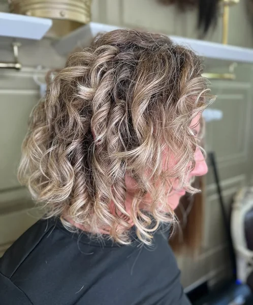 Curly Ash Blonde Bob with Defined Spirals