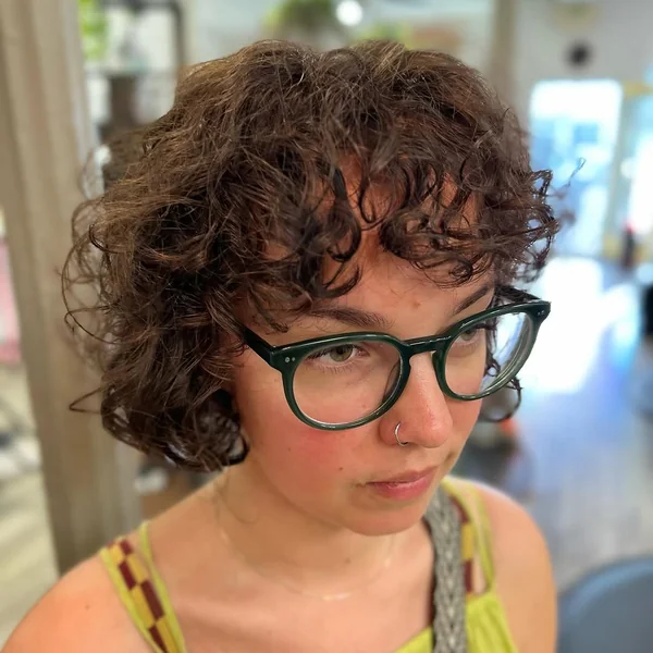 Curly Brunette Shaggy Bob with Piecey Bangs