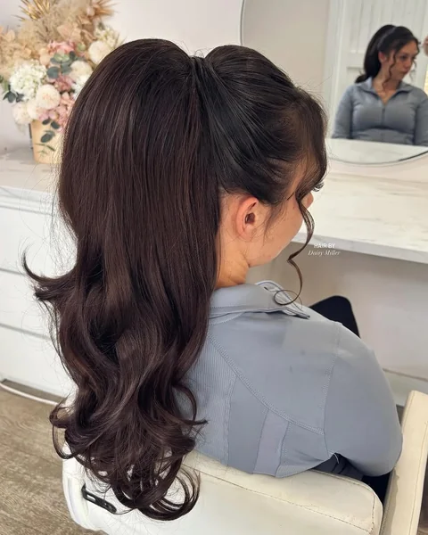 Dark Brunette High Ponytail with Bouncy Volumized Curls