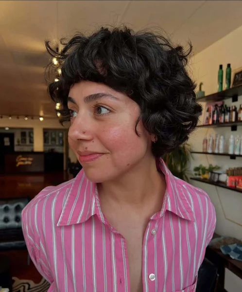 Dark Textured Curly Bob with Baby Bangs