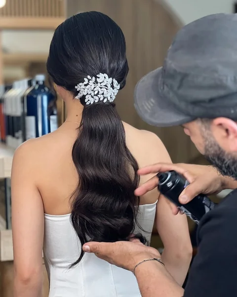Deep Side-Parted Ponytail with Long Beach Waves