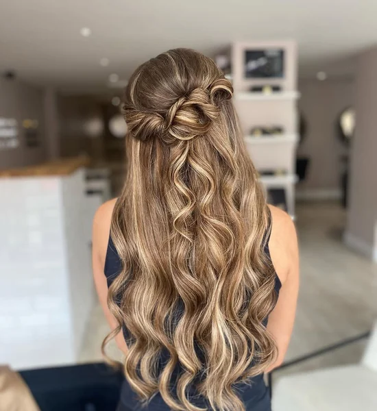 Dimensional Blonde Half-Up Knot with Beach Waves