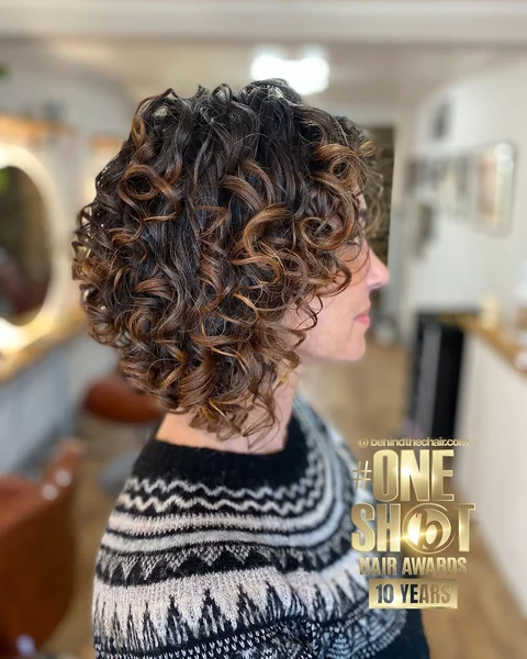 Dimensional Bronde Curly Bob with Defined Ringlets
