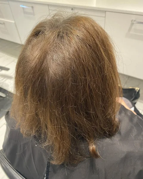 Dimensional Golden-Blonde Stacked Bob with Dark Undercut