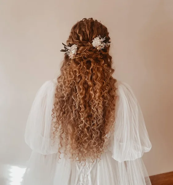 Dimensional Golden-Brown Curly Bob with Voluminous Shape