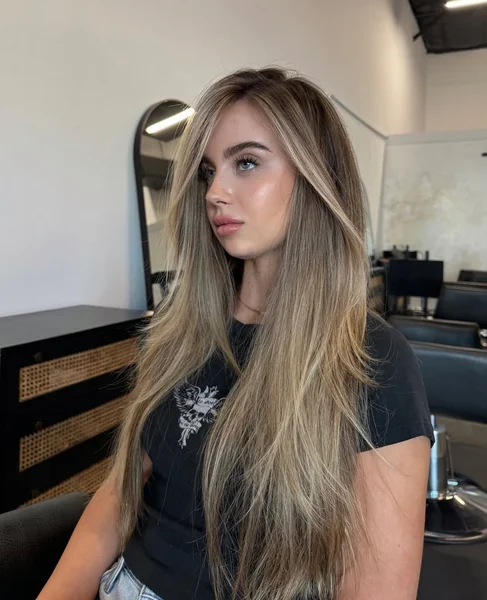 long layered haircuts side part