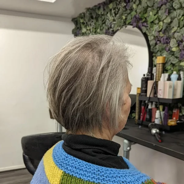 Edgy Ash Blonde Pixie with Tapered Undercut