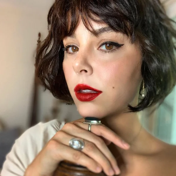 Edgy Brunette Micro-Bob with Piecey Fringe
