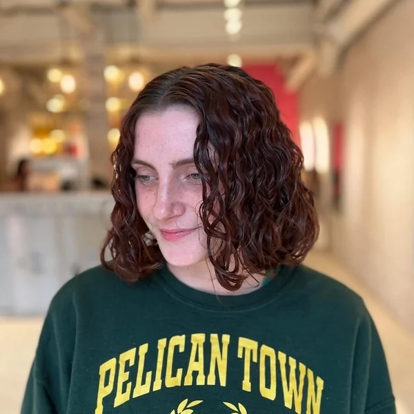 Effortless Auburn Wavy Bob with Center Part