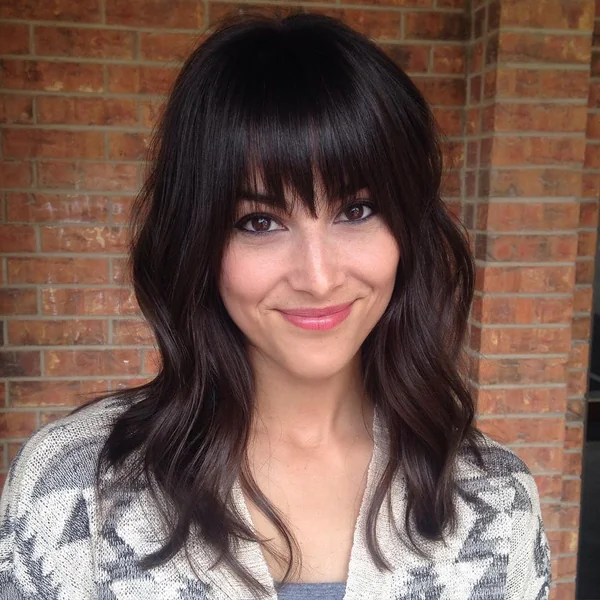 Effortless Caramel Waves with Wispy Eyelash Bangs