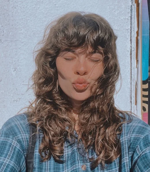 Effortless Sun-Kissed Shag with Wispy Textured Bangs
