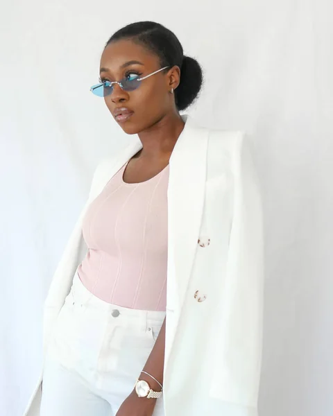 Effortless Twisted High Bun with Face-Framing Strands