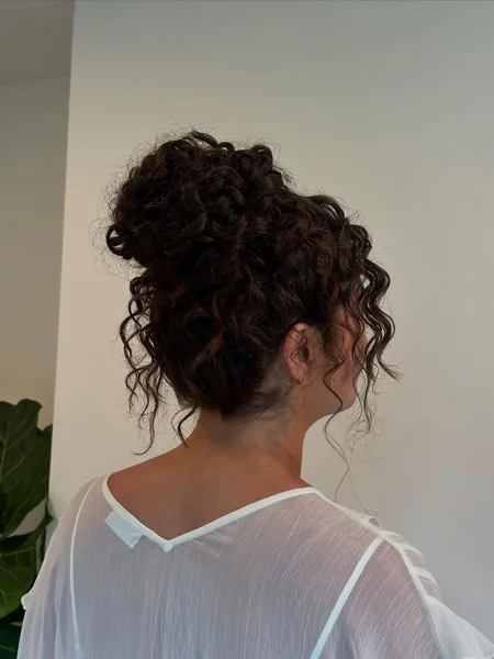 Elegant High Curly Updo with Romantic Tendrils