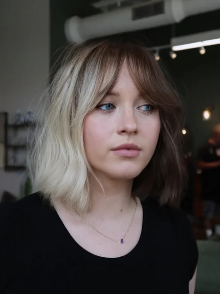 Elegant Mushroom Brown Bob with Sweeping Airy Fringe