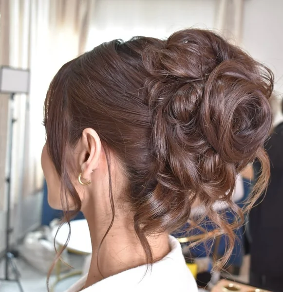 Elegant Side-Swept Bun with Vintage Finger Waves