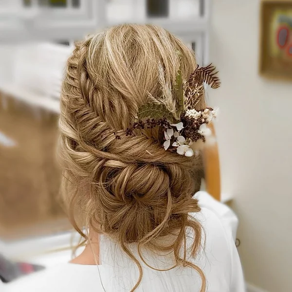 Enchanting Bohemian Fishtail Bun with Dried Florals
