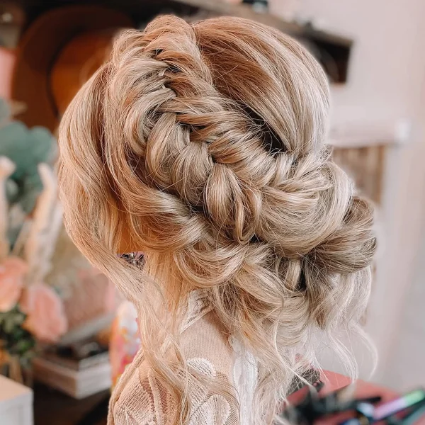 Ethereal Blonde Braid with Delicate Floral Accents