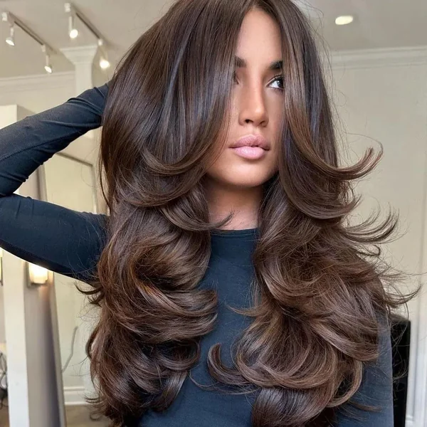 Feathered Caramel Brunette Layers with Airy Wispy Bangs