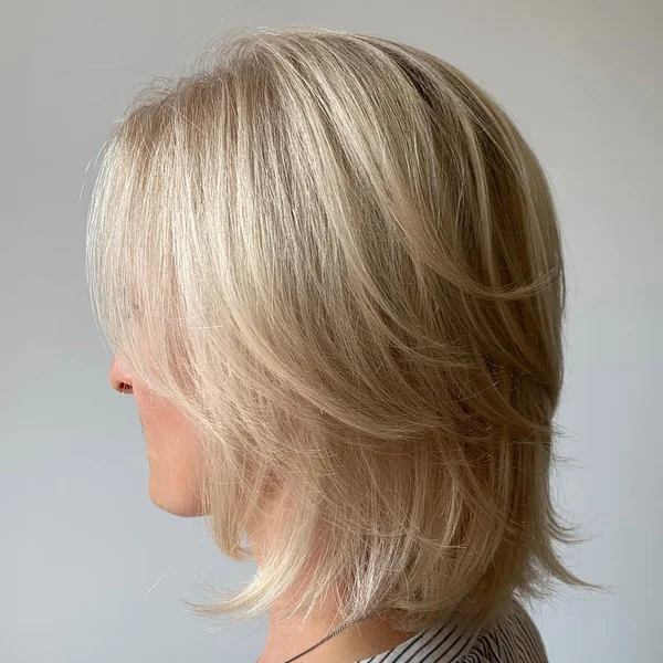 Feathered Champagne Blonde Lob with Wispy Layers