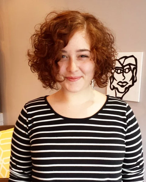 Fiery Copper Curly Bob with Voluminous Side Part