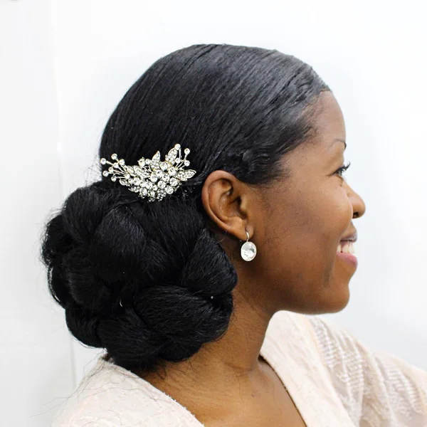 Glamorous Braided Low Bun with Sparkling Jeweled Comb