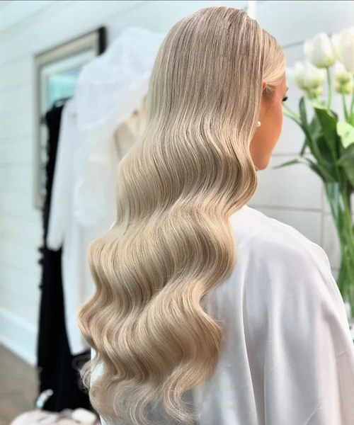 Glamorous Brunette High Pony with Voluminous Waves