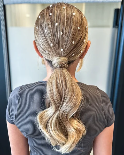 Glamorous Low Ponytail with Pearl Embellishments