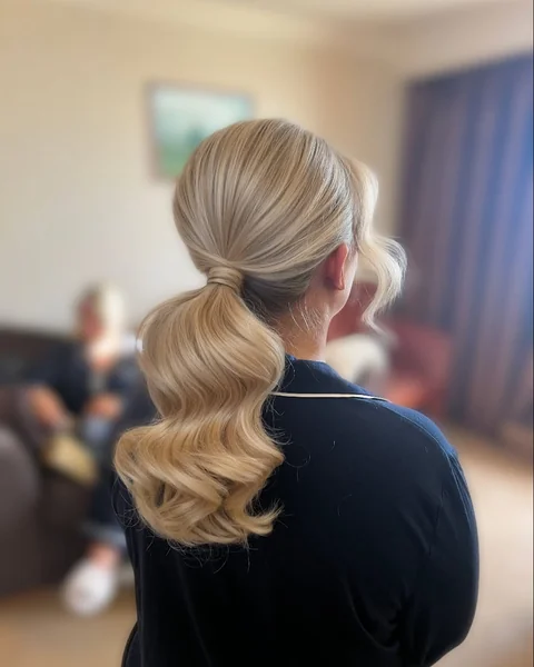 Glamorous S-Wave Low Ponytail with Voluminous Sweep