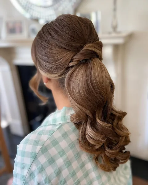 High-Shine Slick Back Ponytail with Minimal Wave