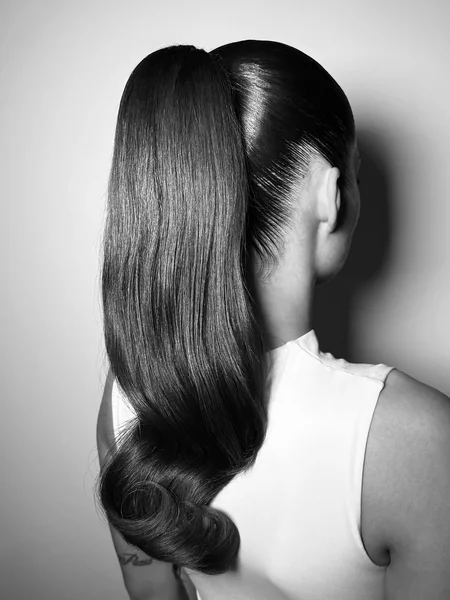 High-Shine Slick Ponytail with Polished Wavy Ends