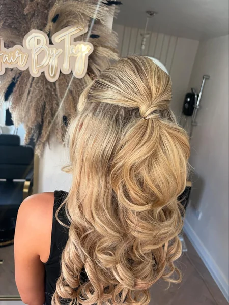High Volume Blonde Half-Up Knot with Cascading Curls