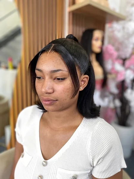 High Textured Ponytail with Smooth Face-Framing Curls