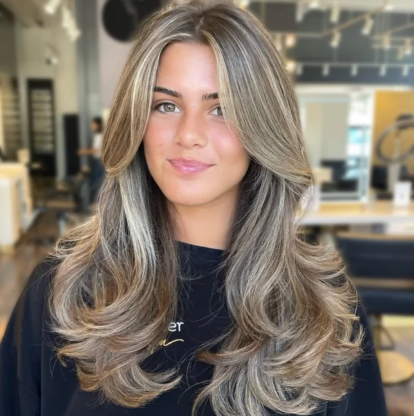 Honey-Blonde Butterfly Cut with Sweeping Face-Framing Layers