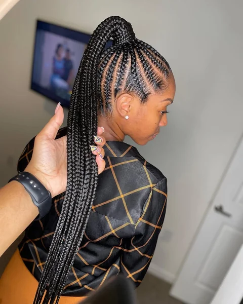 Intricate Cornrow High Ponytail with Long Braided Tail