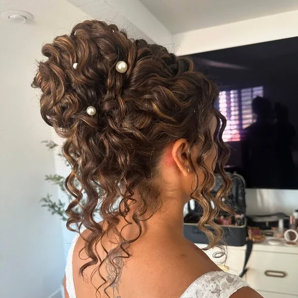 Intricate Curly Bridal Updo with Pearl Accents