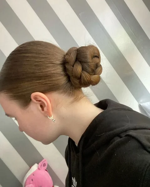 Intricate Woven Low Bun with Sleek Blonde Texture