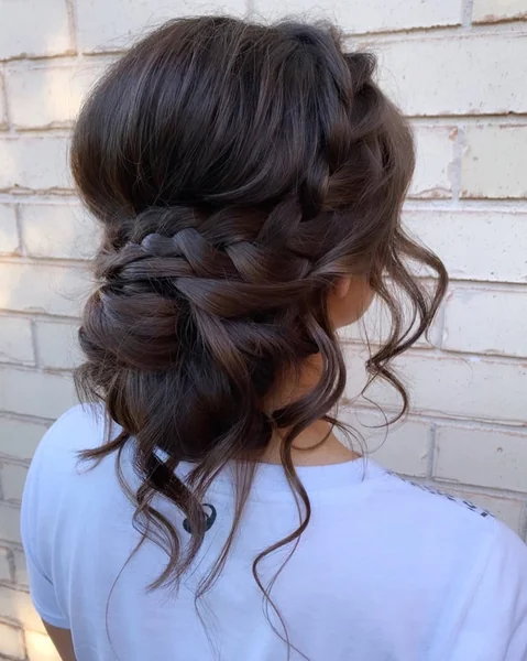 Loose Braided Updo with Romantic Face-Framing Tendrils
