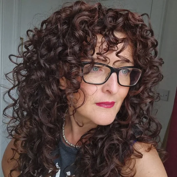 Mahogany Voluminous Shag with Spiraled Face-Framing Layers